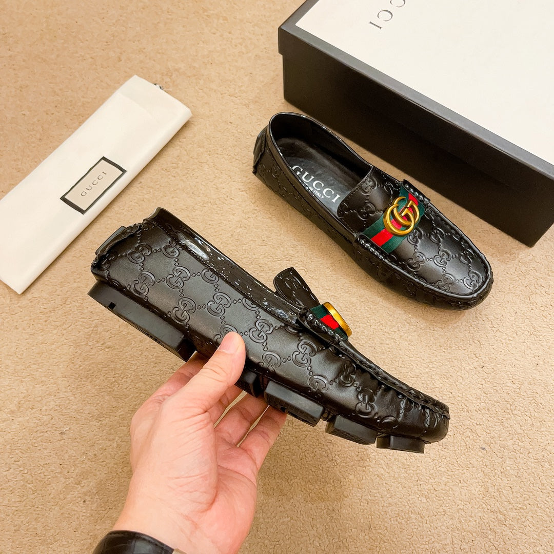 Letter-embossed leather loafers 1824040713