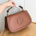 GG New saddle flap design bag 25122402