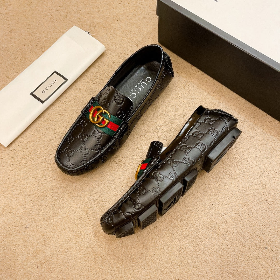 Letter-embossed leather loafers 1824040713