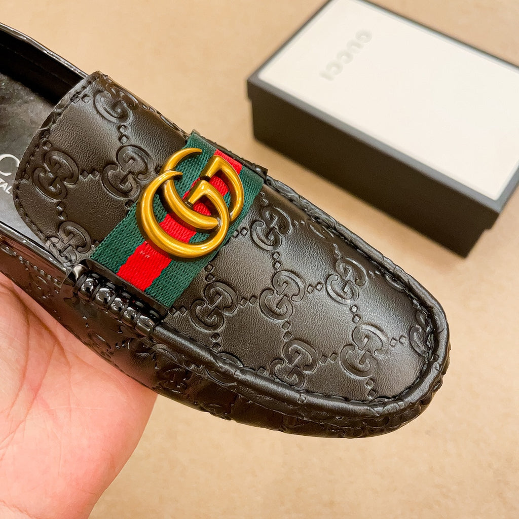 Letter-embossed leather loafers 1824040713