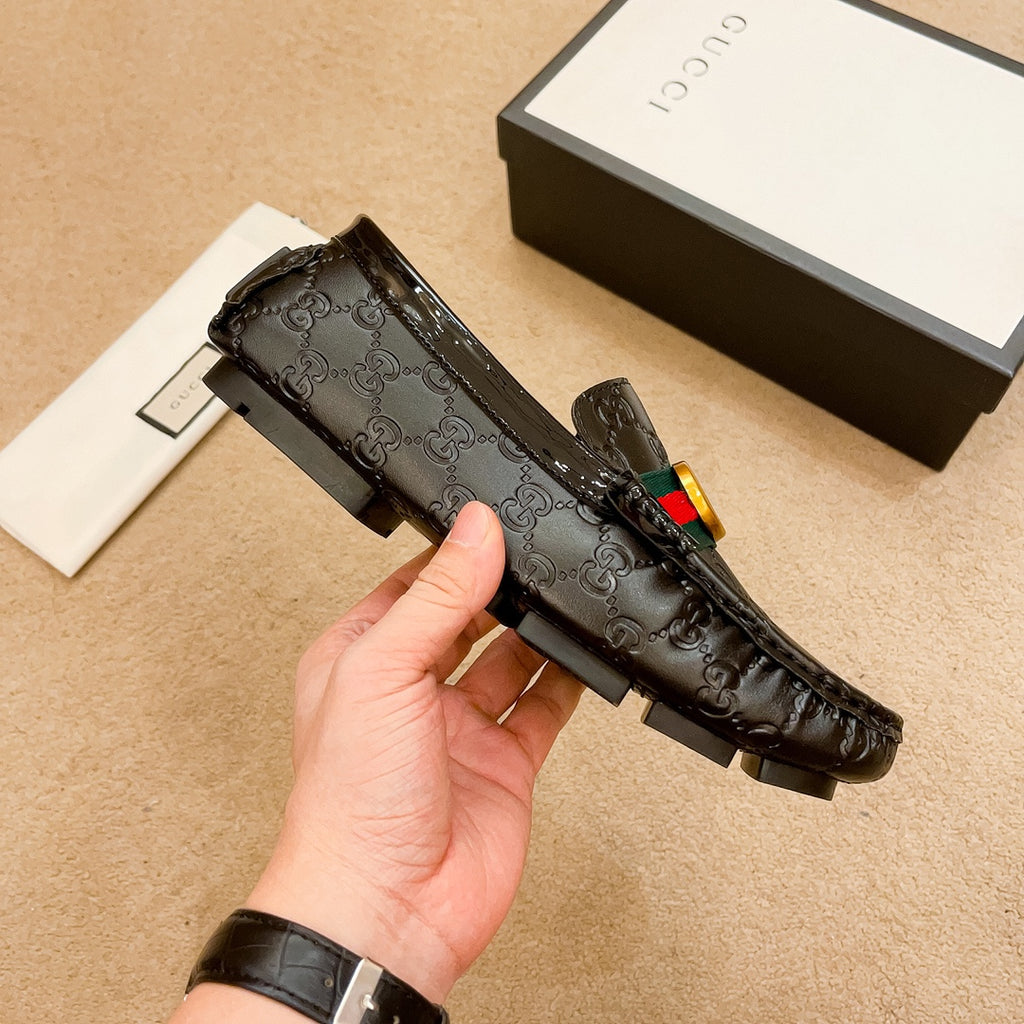 Letter-embossed leather loafers 1824040713
